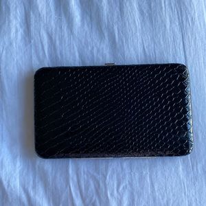 Black wallet/ clutch .